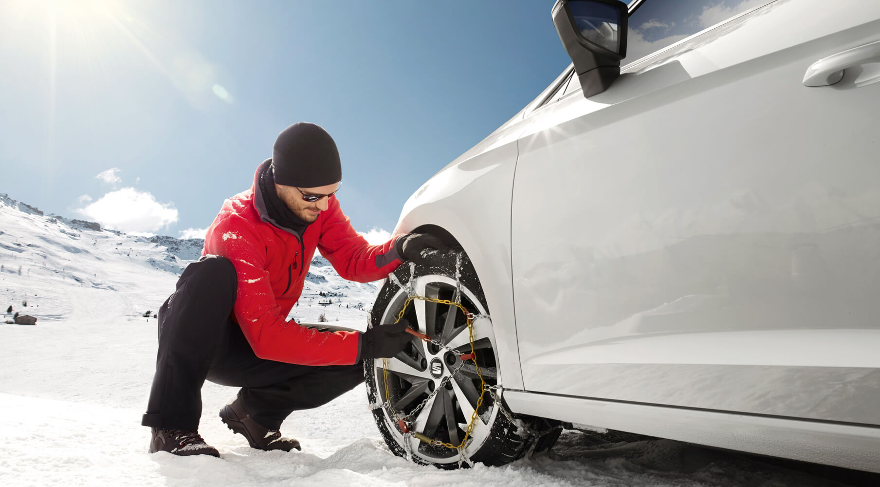 Schneeketten für PKW und die Bedeutung von Felgenschutz im Wintereinsatz